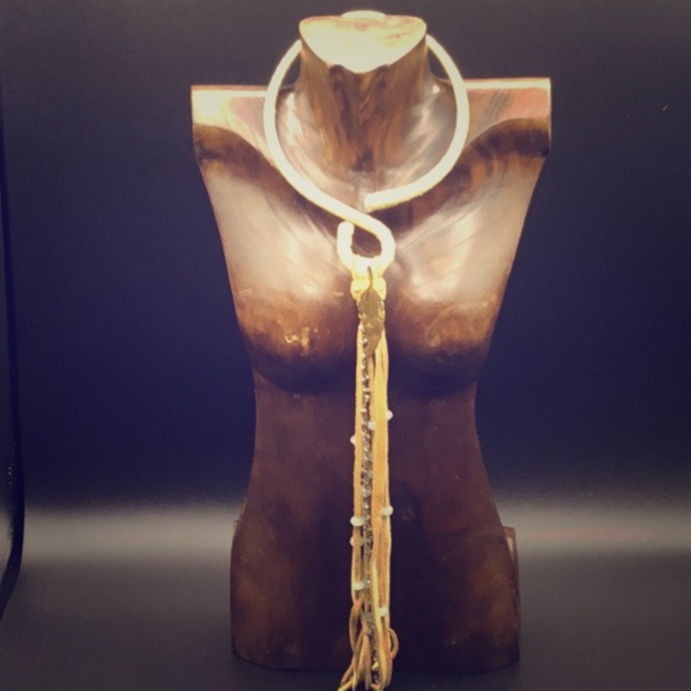 Leather wrapped neck wire with tassel drop